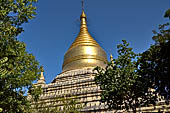 Bagan Myanmar. Next to the Gubyaukgyi stands the gilded Myazedi or 'Emerald Stupa'. 